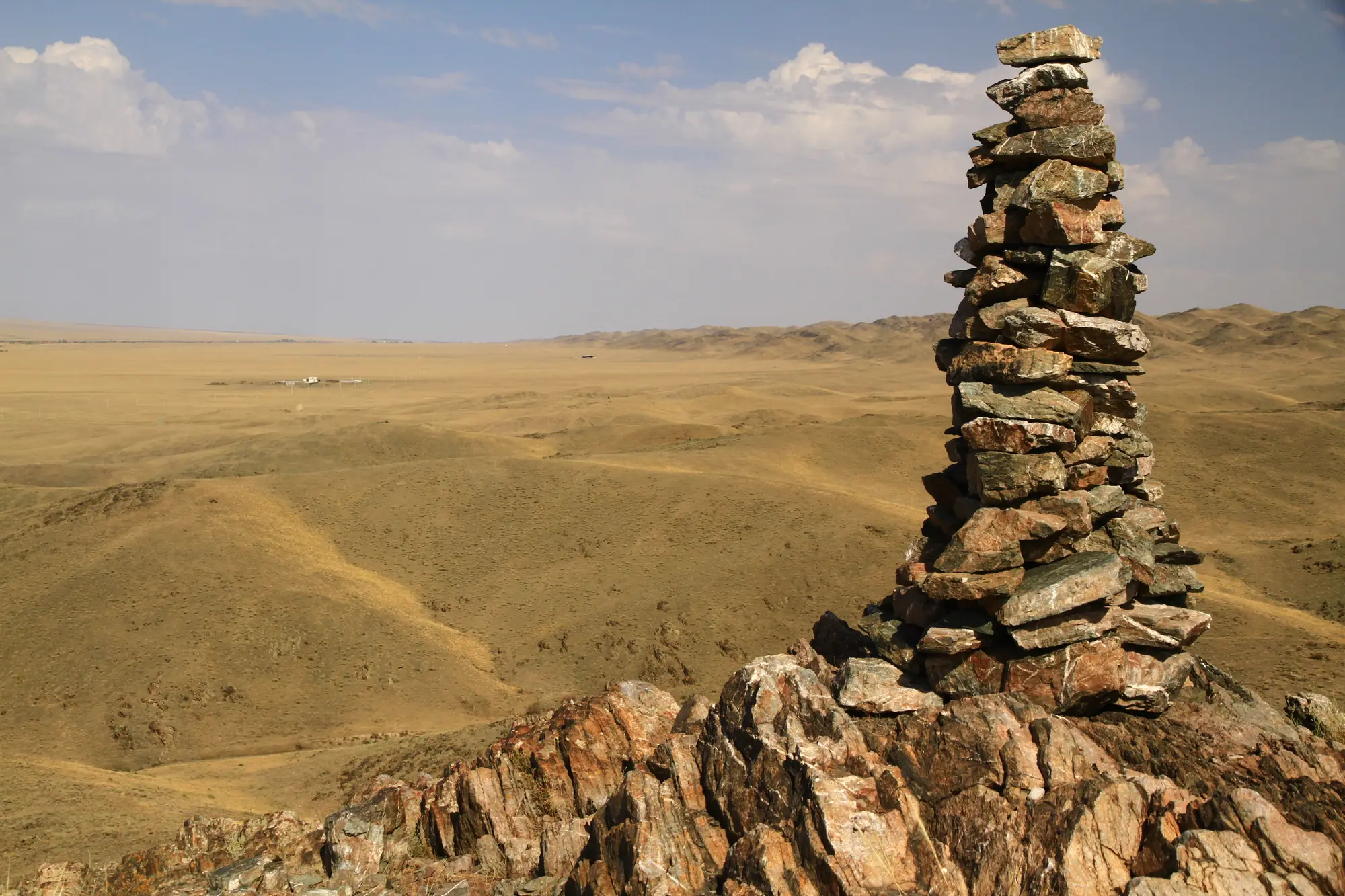A stone cairn above the steppe