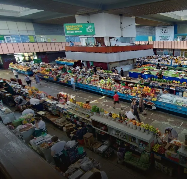 Fruit and vegetable stalls in the main hall of the Green Bazaar
